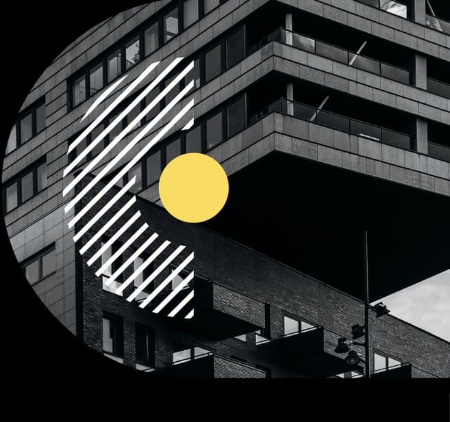 Modern building facade with striped circle graphic